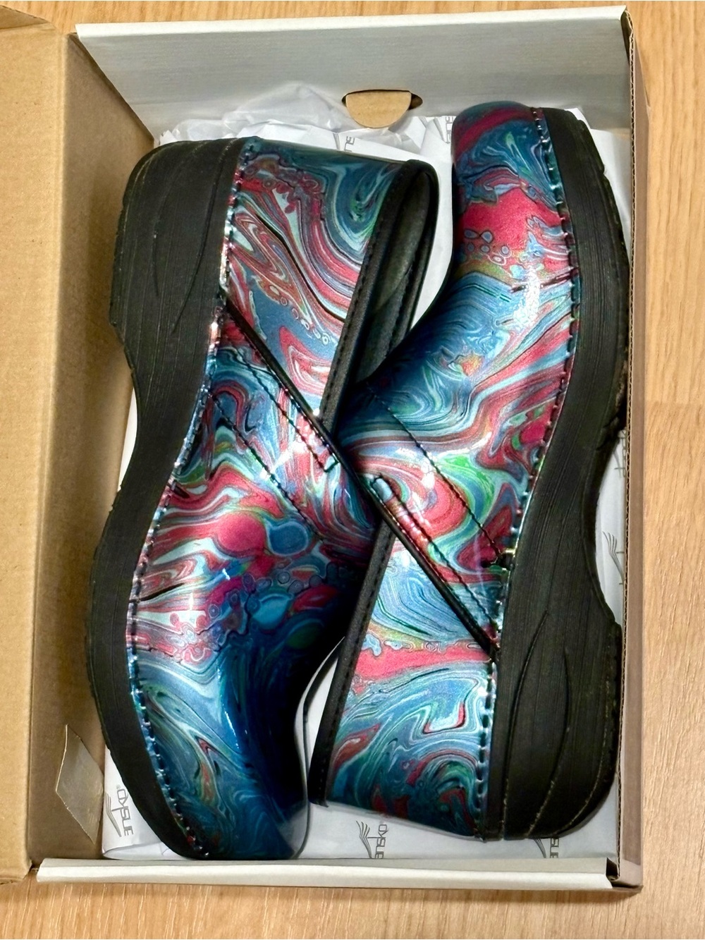 Dansko Multicolor Swirl Leather Clogs in Blue, Pink, Teal